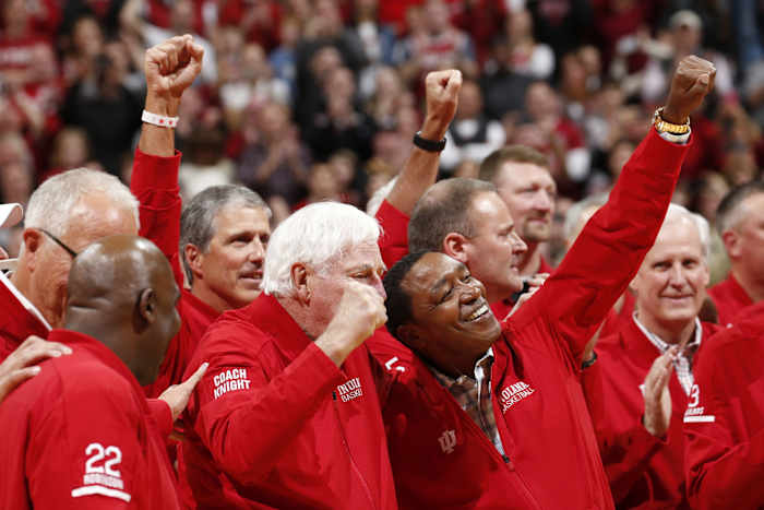 Bob Knight and dozens of his players, including Hall of Famer Isiah Thomas, cheer at center court at Assembly Hall on Saturday. (USA TODAY)